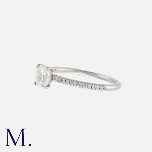 116 - A Radiant-Cut Diamond Ring in platinum, set with a radiant cut diamond weighing approx. 0.70ct, (est... 