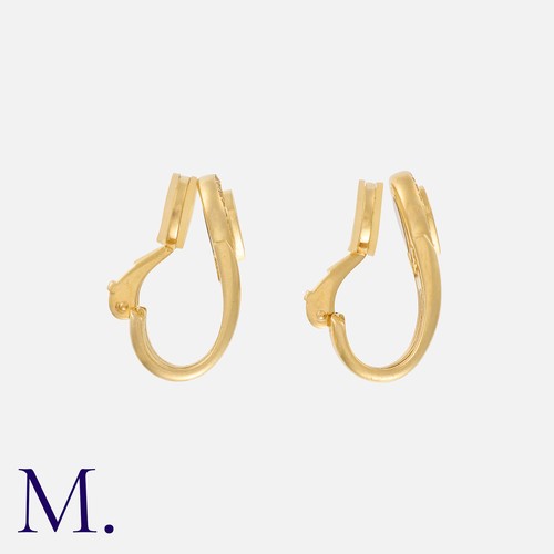 72 - CHOPARD, A Pair Of 'Happy Diamonds' Earrings in 18k yellow gold, of diamond set hoop design, the top... 