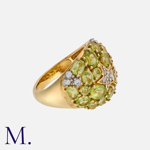 74 - A Peridot And Diamond Ring in silver, set with oval cut peridot and diamonds, Marked 925. 

Size: N
... 