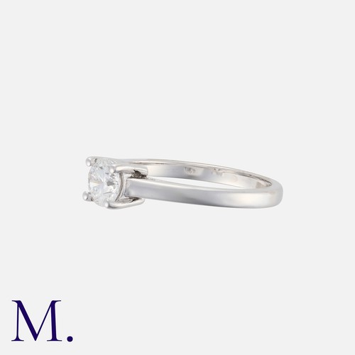 199 - A Diamond Solitaire Ring in 14k white gold, set with a principal round cut diamond of approximately ... 