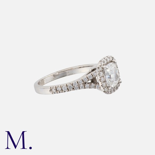 109 - A Diamond Ring in 14k white gold, set with a central radiant cut diamond of approximately 1.0t, with... 