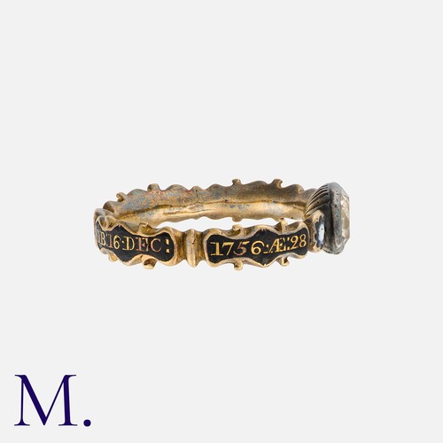 3 - An Antique Georgian Rock Crystal And Enamel Mourning Ring in yellow gold, set with a principal facet... 