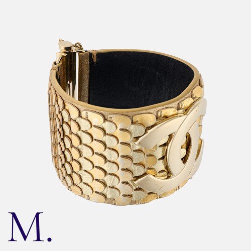 88 - CHANEL, Metallic Calfskin Scale CC Cuff Bracelet, featuring metallic leather 'scales' featuring a la... 