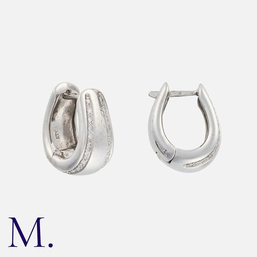 157 - A Pair Of Diamond Hoop Earrings in 18k white gold, set with two rows of round cut diamonds totalling... 