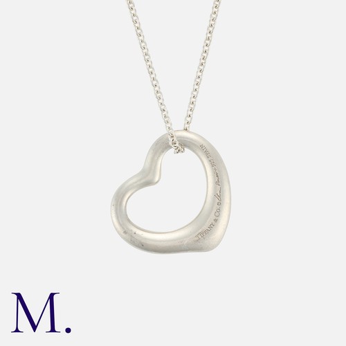 122 - TIFFANY & CO, An Open Heart Pendant By Elsa Peretti in silver, Designed as an open heart, on a fine ... 