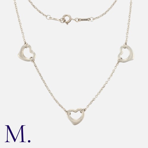 169 - Tiffany & Co, A Triple Open Heart Necklace, By Elsa Peretti in silver, Designed as three open hearts... 