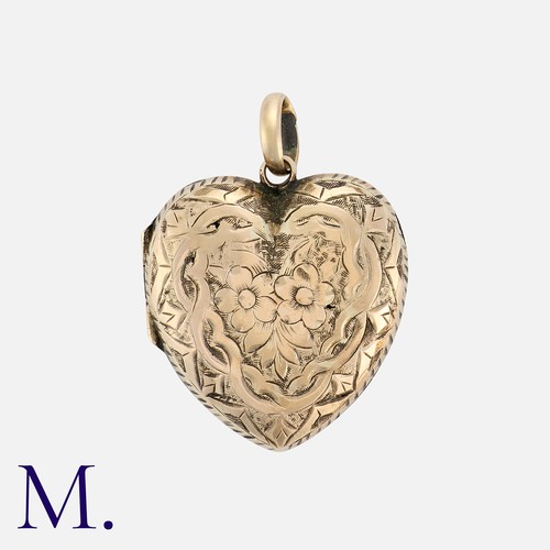 168 - A Heart Locket with engraved decoration in yellow metal.  With locket front and back.

Size: 2.6cm
W... 