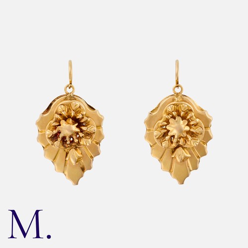 125 - A Pair of Antique Earrings in yellow gold, with foliate decoration to a leaf-shaped design.  Unmarke... 