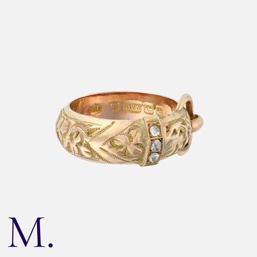 6 - An Antique Buckle Ring in 9K yellow gold, set with three rose cut diamonds to the belt loop, with or... 