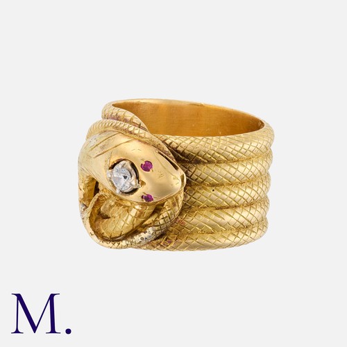 182 - A Heavy Gold Antique Snake Ring in 18K yellow gold with five wide coils set with a round cut diamond... 