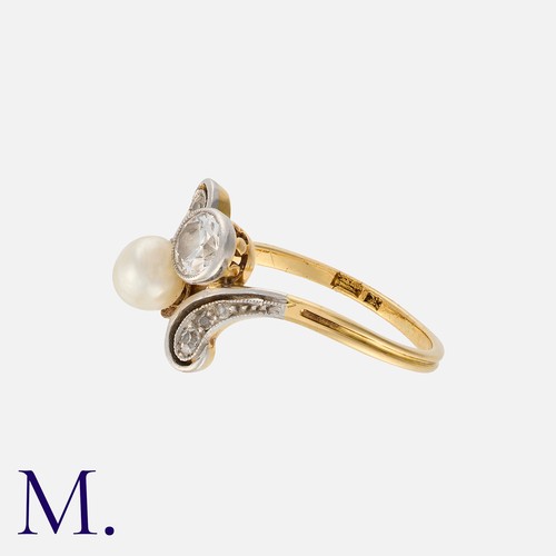 127 - An Antique Pearl and Diamond Ring in 18K yellow and white gold, set with a pearl and round cut diamo... 