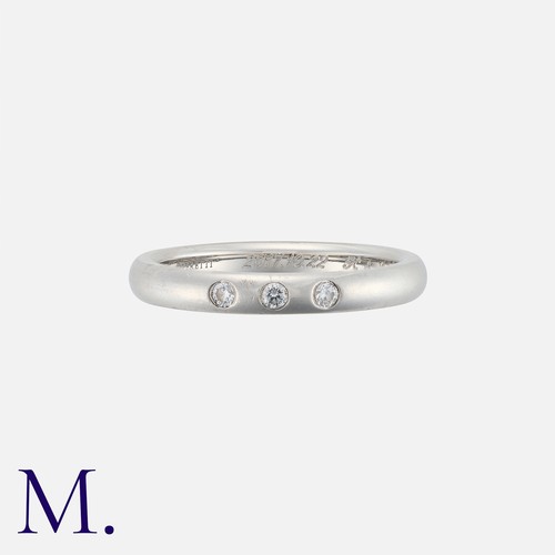 92 - TIFFANY & CO. A Diamond Gypsy Ring in platinum, set with three round cut diamonds weighing approxima... 