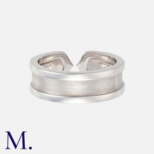 154 - CARTIER. A 'C de Cartier' Ring in 18K white gold.  Signed Cartier and marked for 18ct gold.  With Ca... 