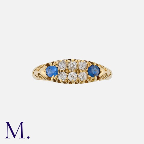 88 - A Sapphire And Diamond Ring in 18k yellow gold, set with six old cut diamonds weighting approximatel... 