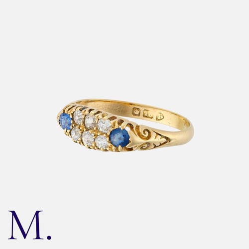 88 - A Sapphire And Diamond Ring in 18k yellow gold, set with six old cut diamonds weighting approximatel... 