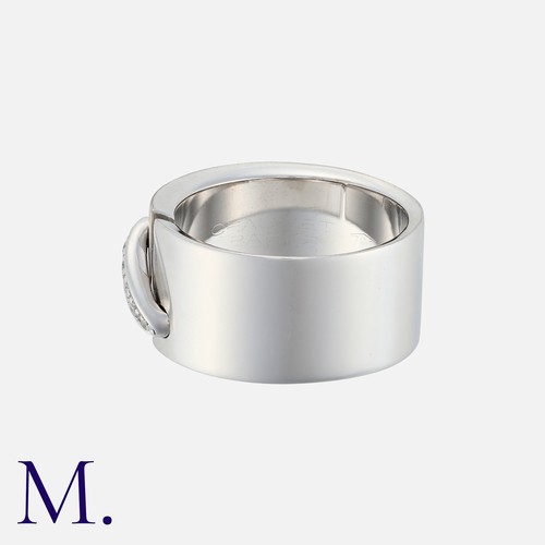 147 - CHAUMET. A Jeux De Liens Diamond Ring in 18k white gold, the wide band featuring a 'bridge' set with... 