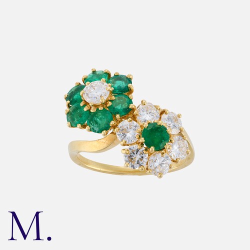 47 - VAN CLEEF & ARPELS. An Emerald and Diamond Ring in 18K yellow gold, set with round cut emeralds and ... 