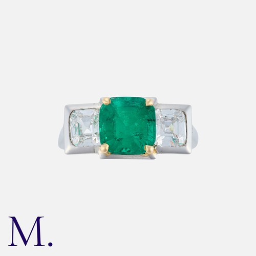 119 - A Columbian Emerald and Diamond Ring in platinum, set with facetted square cut emerald (accompanied ... 