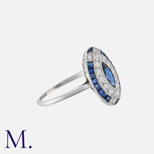 134 - An Art Deco Sapphire and Diamond Ring in platinum, set with a marquise sapphire to the centre with c... 