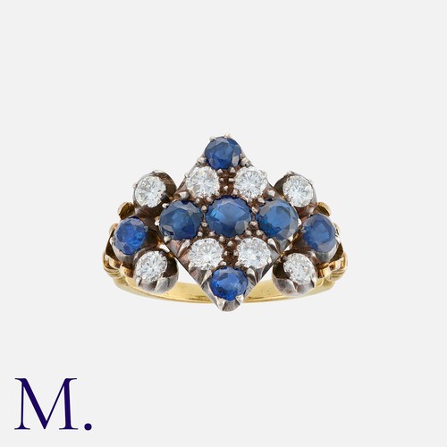 65 - An Antique Sapphire And Diamond Ring in yellow gold, of kite shape, set with round cut sapphires and... 