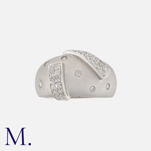 120 - A Diamond Ring in 18k white gold, of bombé form, set with round cut diamonds totalling approximately... 