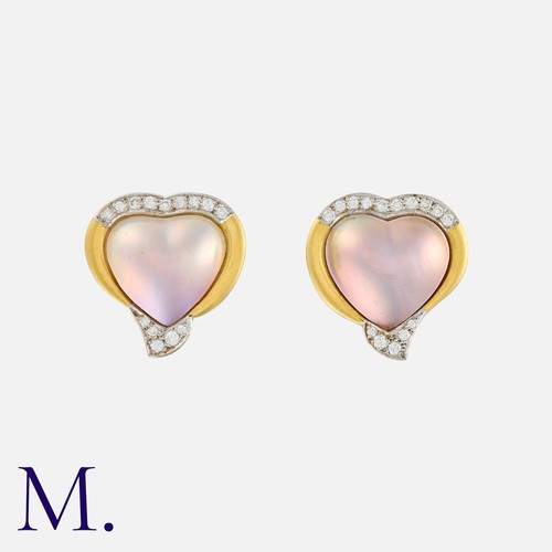 131 - A Pair Of mother of Pearl And Diamond Heart Earrings in 18k yellow gold, comprising heart shape moth... 