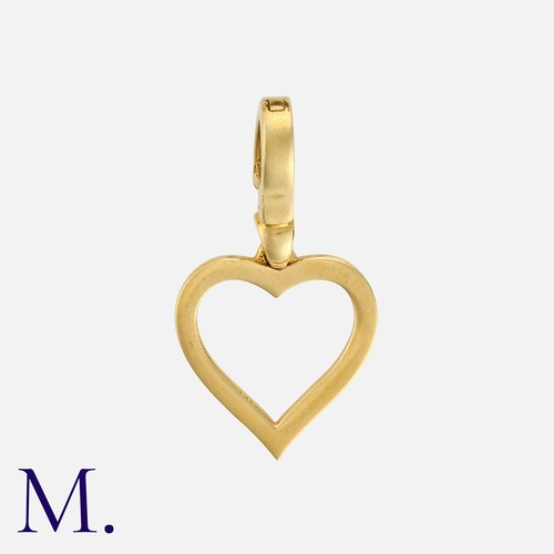 123 - THEO FENNEL, A Heart Pendant in 18k yellow gold, comprising a heart shaped charm / pendant. Hallmark... 