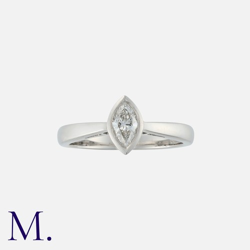 69 - A Diamond Solitaire Ring in platinum, set with a central marquise cut diamond of approximately 0.40c... 