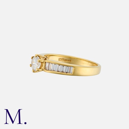 161 - A Diamond Solitaire Ring in 18k yellow gold, set with a central round cut diamond of approximately 0... 