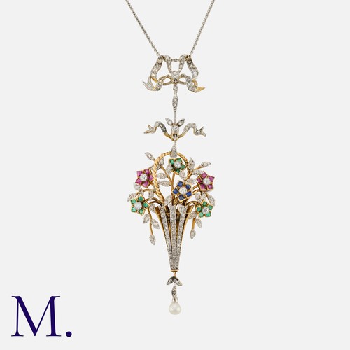 133 - A Fine Edwardian Giardinetto Pendant and Chain in platinum and yellow gold, set with ruby, sapphire,... 