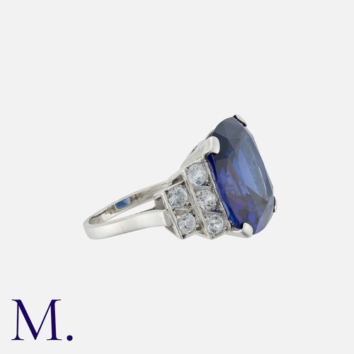 170 - A Blue Paste Ring in white metal, set with a large blue paste, accented by white gemstones. Unmarked... 