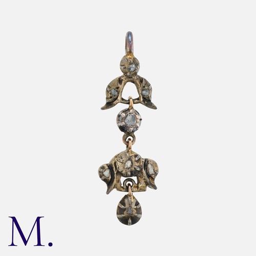 164 - A Rose Cut Diamond Pendant in yellow gold and silver. Of foliate design, set with rose cut diamonds.... 