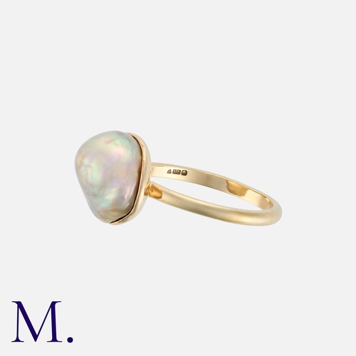 18 - A Natural Pearl Ring in 9k yellow gold, set with a natural saltwater pearl of approximately 12.0mm. ... 