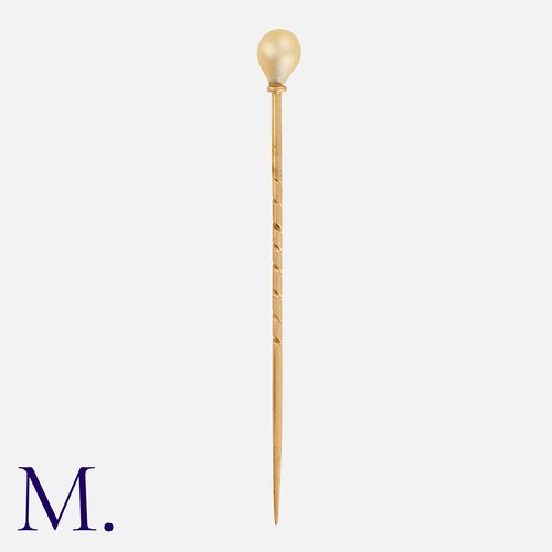 262 - A Pearl Pin in yellow gold, with a pearl top (untested).  Unmarked; tests indicate pin is 14ct gold.... 