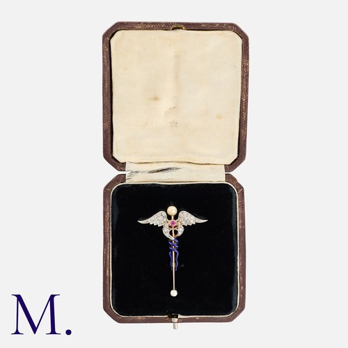 168 - A Victorian Enamel, Pearl, Ruby And Diamond Caduceus Brooch comprising two entwined snakes with blue... 