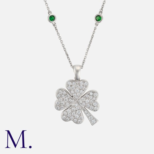 107 - A Diamond And Green Garnet Necklace in white gold, comprising a four leaf clover pendant set with ap... 