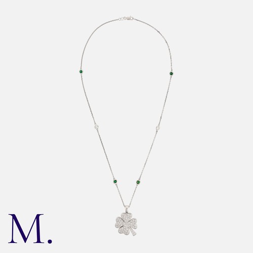 107 - A Diamond And Green Garnet Necklace in white gold, comprising a four leaf clover pendant set with ap... 