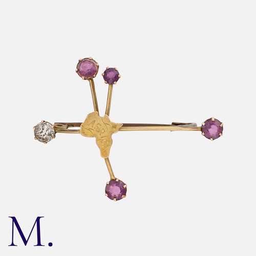 245 - A Gem-Set Southern Cross Brooch in yellow gold, with gems-set constellation points.  Unmarked; tests... 