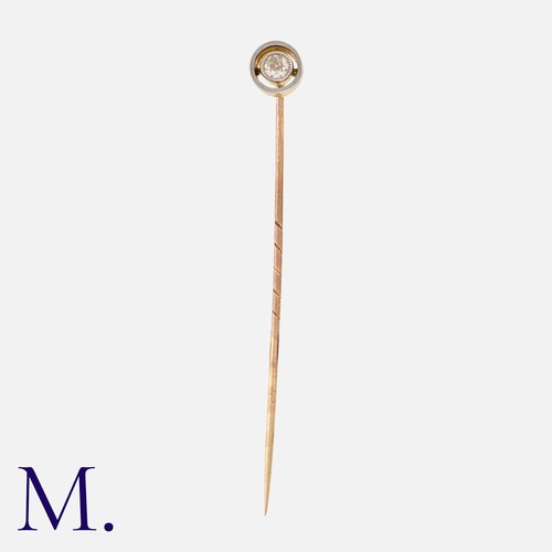 247 - An Antique Diamond Stick Pin in yellow gold set with an old cut diamond weighing approx. 0.18ct.  Wi... 