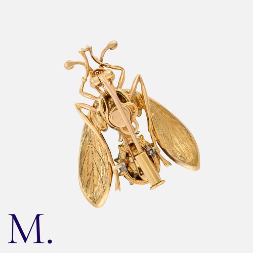 147 - A Gem-Set Insect Brooch in 18k yellow gold, comprising a cabochon emerald set body with ruby eyes, t... 