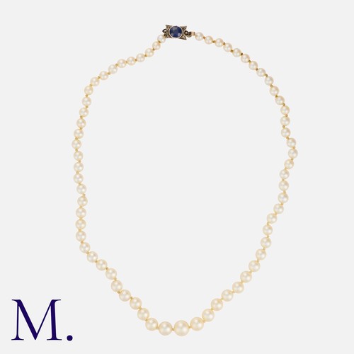 156 - A Pearl Necklace in yellow gold and silver, comprising a single strand of drilled pearls measuring a... 