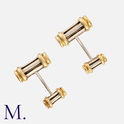 144 - TIFFANY & Co. A Pair of Cufflinks in yellow gold and silver baton form.  Marked Tiffany & Co. with h... 