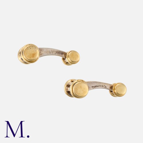 144 - TIFFANY & Co. A Pair of Cufflinks in yellow gold and silver baton form.  Marked Tiffany & Co. with h... 