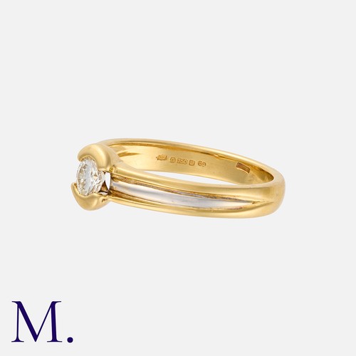 157 - A Diamond Ring in 18K yellow and white gold, set with a single round brilliant cut diamond, weighing... 