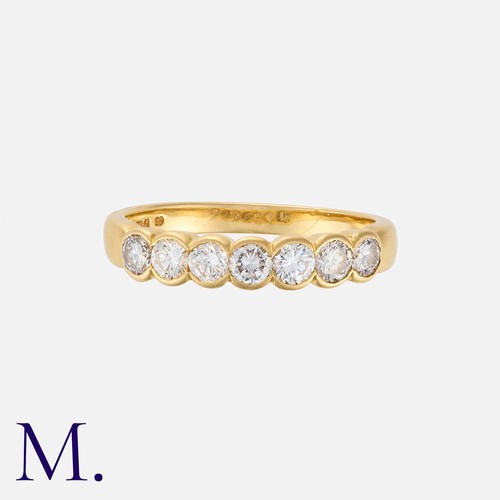 122 - A Diamond 7-Stone Ring in 18K yellow gold, set with seven round brilliant cut diamonds of good colou... 