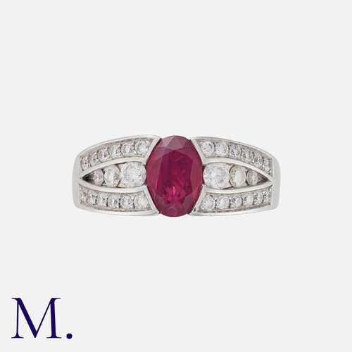 139 - A French Ruby and Diamond Ring in 18K white gold, set with an oval cut ruby weighing approx. 1.2ct w... 
