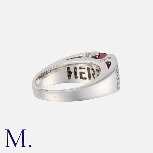 139 - A French Ruby and Diamond Ring in 18K white gold, set with an oval cut ruby weighing approx. 1.2ct w... 