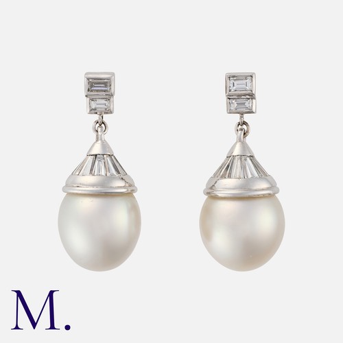 159 - A Pair of Pearl and Diamond Drop Earrings in white gold, set with large cultured pearl drops (approx... 