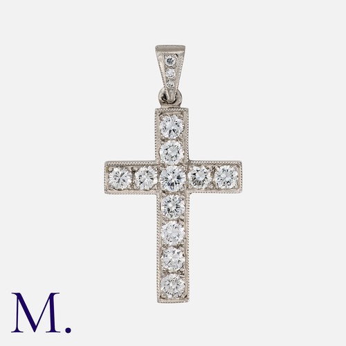 172 - A Diamond Cross Pendant in platinum, designed as a crucifix, set with round cut diamonds totalling a... 