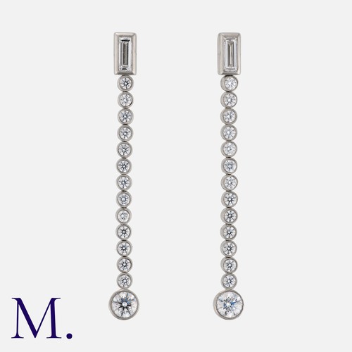 126 - Tiffany & Co, A Pair of Diamond Drop 'Jazz' Earrings in platinum, each comprising a baguette cut dia... 